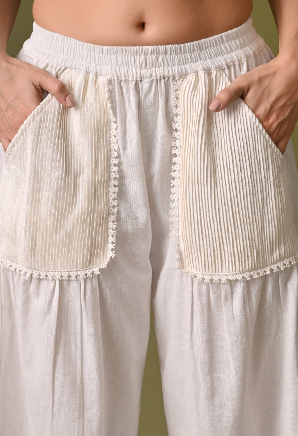 Women casual loose fit off white pleated pocket trouser