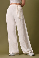Women casual loose fit side button off white trouser